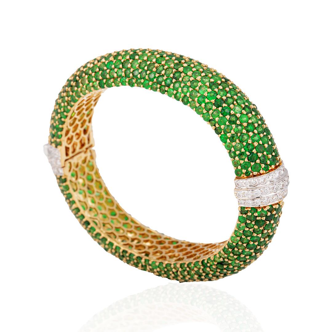 A Tsavorite and diamond bangle