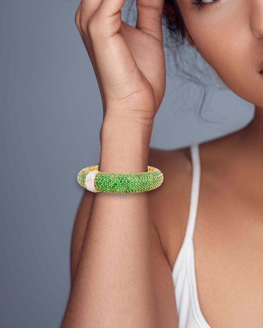 A Tsavorite and diamond bangle
