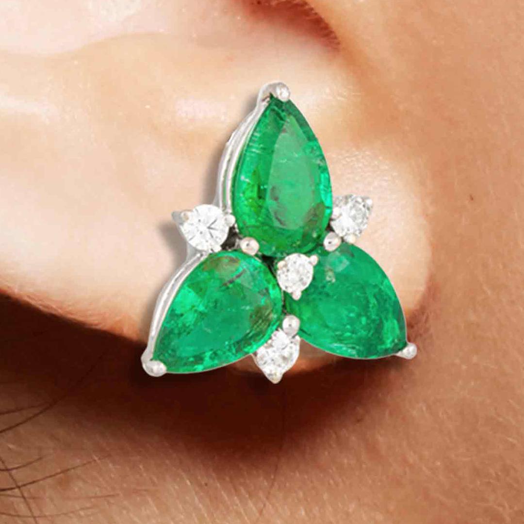 A pair of emerald cluster ear clips