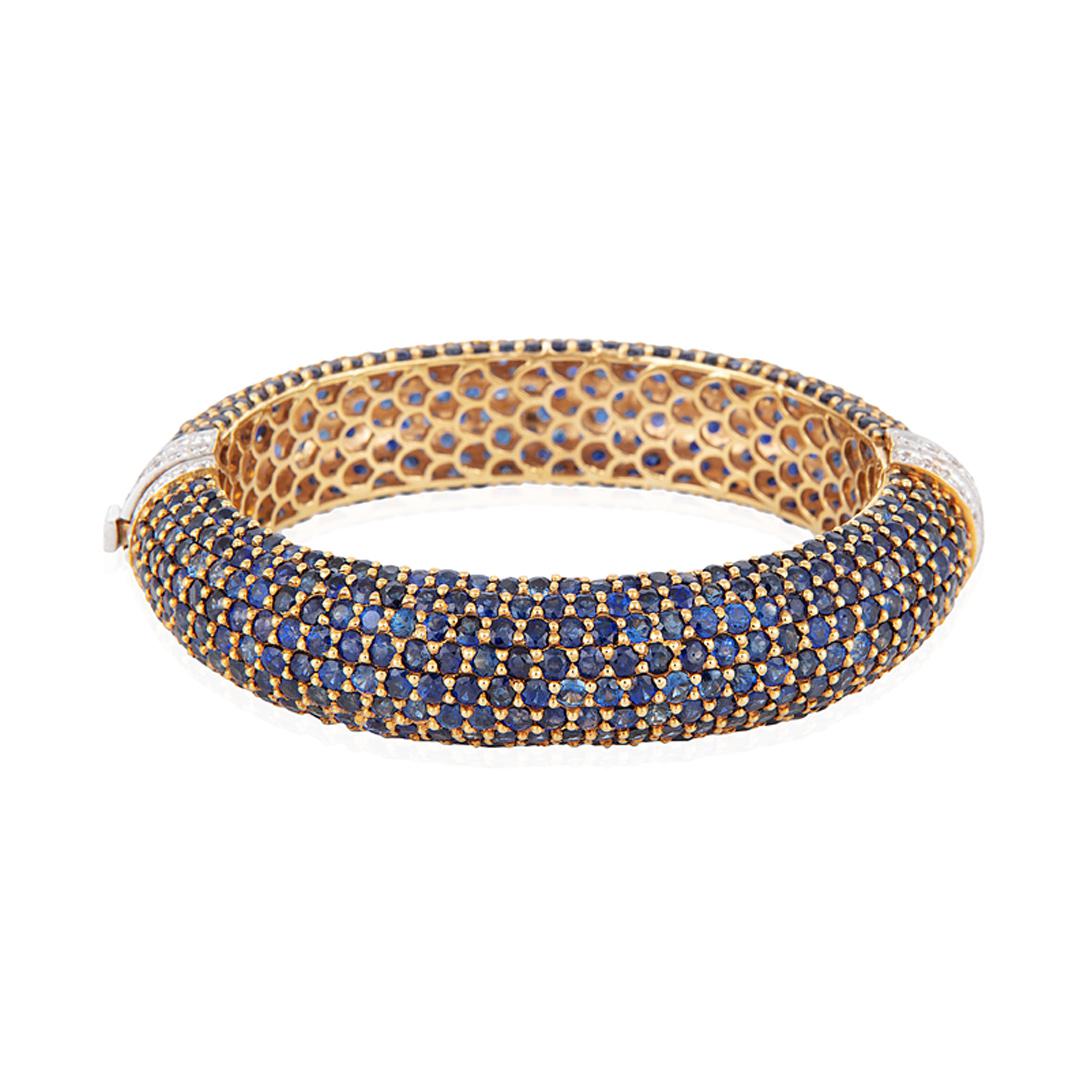 A blue sapphire and diamond bangle