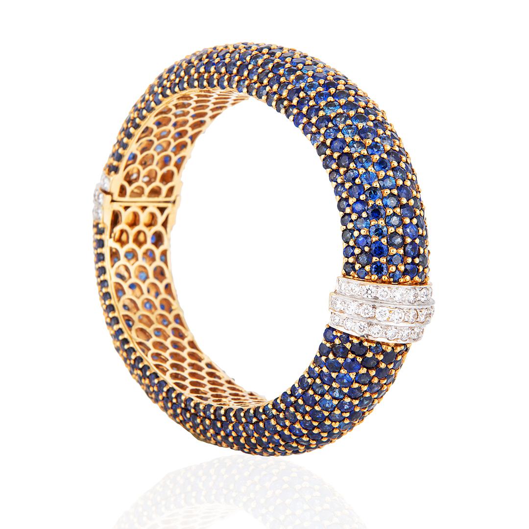 A blue sapphire and diamond bangle