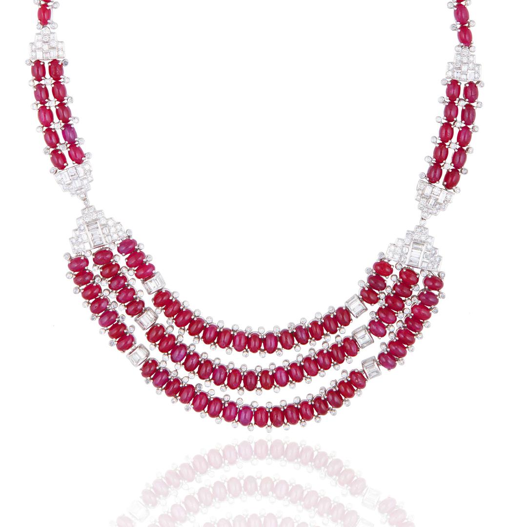 An attractive art deco inspired art deco cabochon ruby and diamond necklace